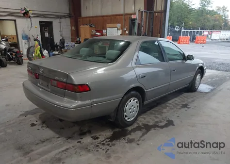 1999 Toyota Camry Le from USA, damaged, VIN 4T1BG22K3XU556347